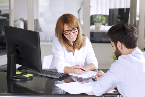 insurance agent helping new customer