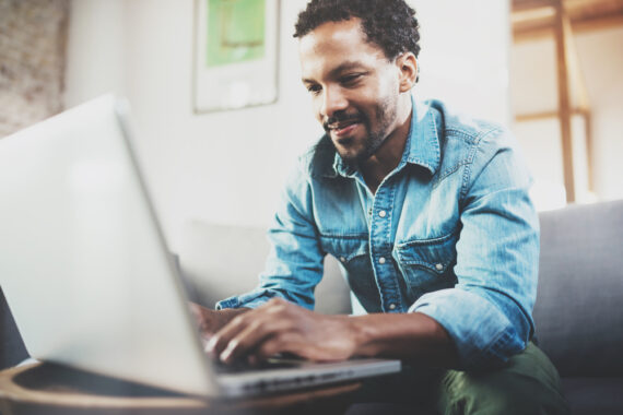 young african american man on computer