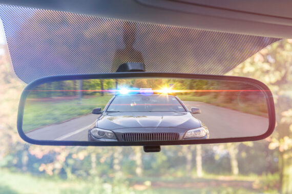 cop lights in rear view mirror