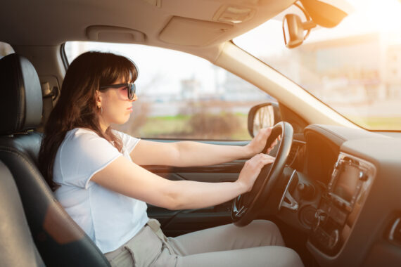 Woman behind the wheel of a car