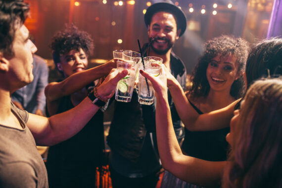 Group of friends drinking at a nightclub